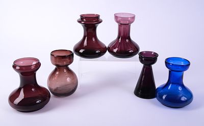 Five Amethyst Glass Vases. Height of tallest 5.75 inches, together with a blue example. Good 