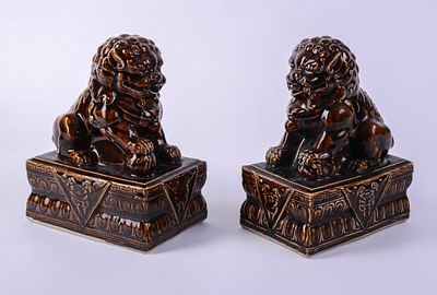 Pair of Porcelain Foo Dogs. Height 10 inches, very good condition.