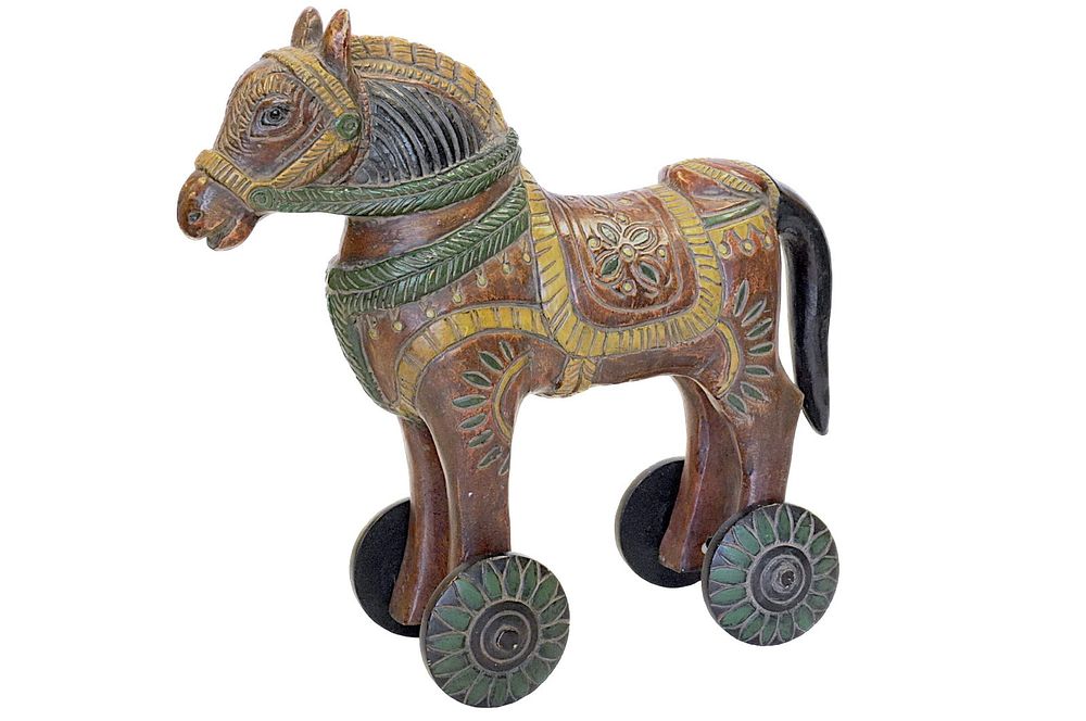 Lot 225: MOROCCAN HAND CARVED WOODEN PULL TOY