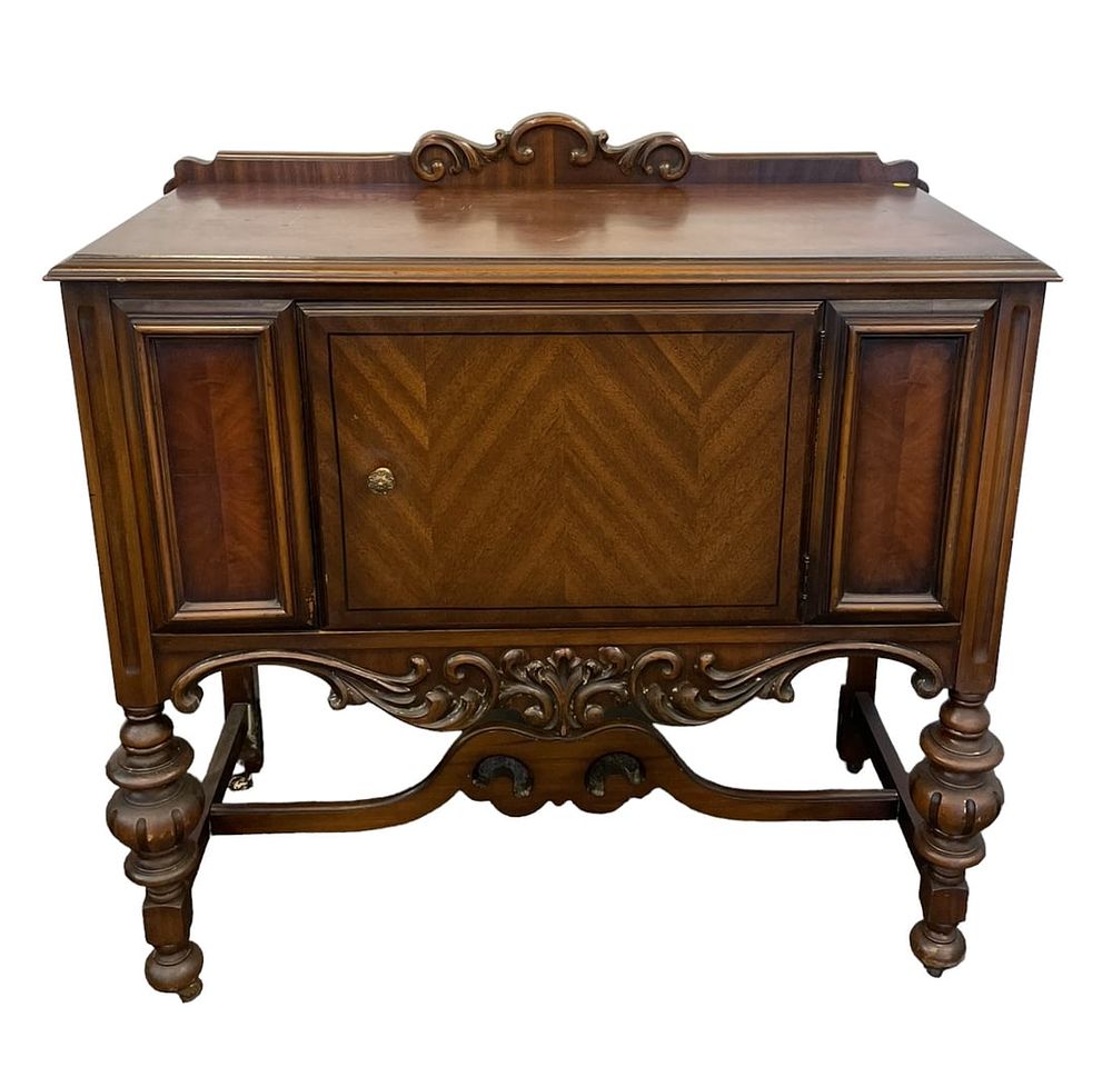 ANTIQUE AMERICAN WALNUT SIDEBOARD. Antique American walnut sideboard.c. 1920s. Carved scroll 