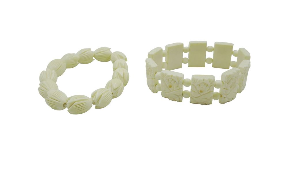 Lot 250: 2 VINTAGE CARVED BONE BRACELETS
