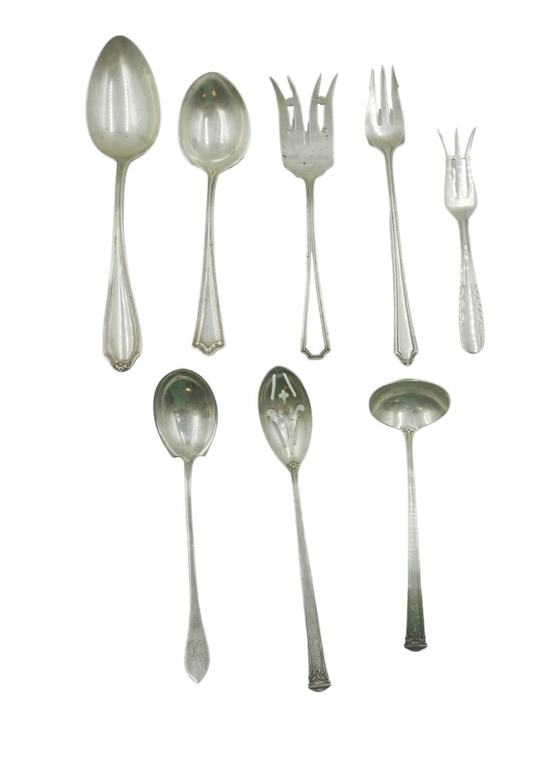 Lot 46: 8 PIECE ANTIQUE STERLING SERVING PIECES FLATWARE