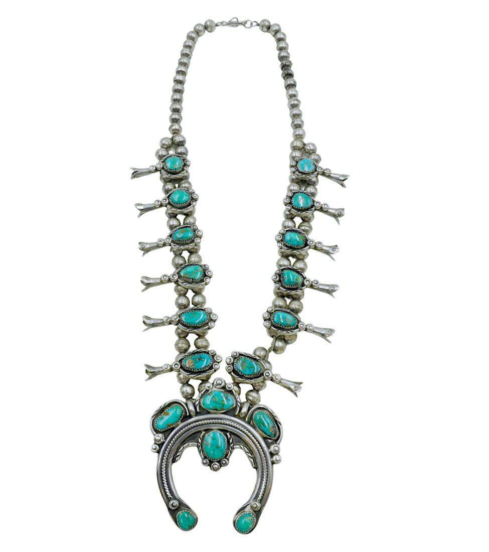 Lot 118: LARGE TURQUOISE STERLING SQUASH BLOSSOM NECKLACE
