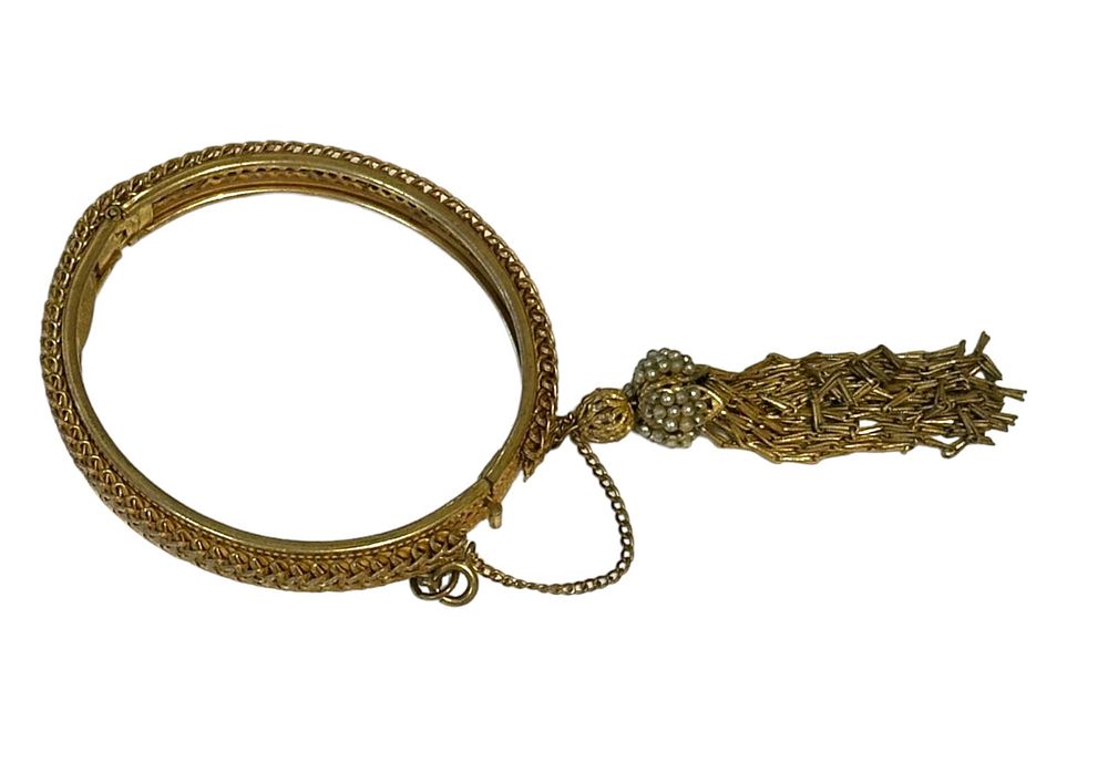 Lot 145: VINTAGE MIRIAM HASKELL HINGED BANGLE BRACELET TASSEL