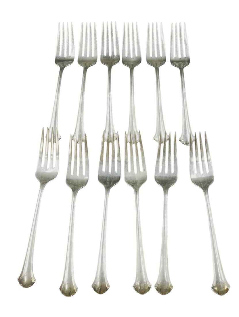 Lot 106: 12 STERLING SILVER CHIPPENDALE SALAD FORKS