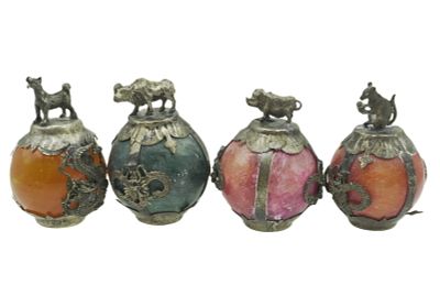 4 ANTIQUE CHINESE ZODIAC CARVED POLISHED ORBS. Four Chinese carved stained quartz ball shaped 