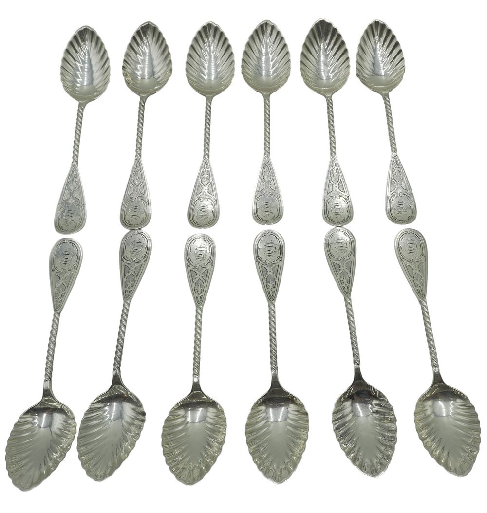 Lot 100: 12 TIFFANY STERLING ANTIQUE ICE CREAM SPOONS