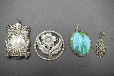 4 PC ANTIQUE STERLING MATCH SAFE - BROOCH - PENDANTS. All are sterling silver, 1- Ornate 