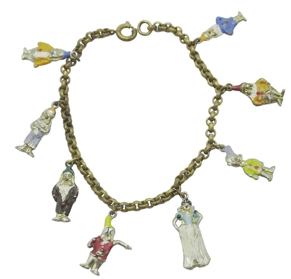 Lot 63: 1938 DISNEY ENAMELED SNOW WHITE & 7 DWARFS BRACELET