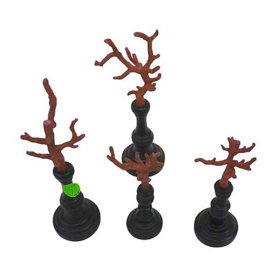 GROUPING OF 4 RED CORAL BRANCHES ON STANDS. Grouping of 4 Red Coral Branches on ebonized wood 