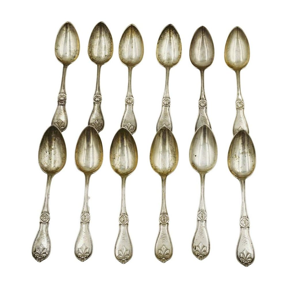 Lot 55: 12 JAMES BUTLER COIN SILVER "LEAF" SPOONS