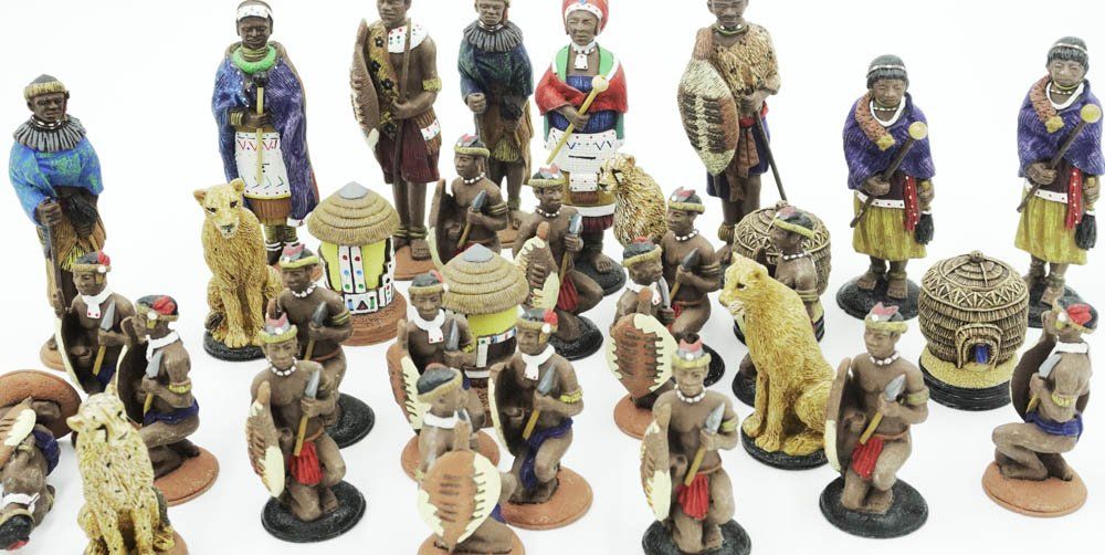 Lot 254: AFRICAN TRIBAL HAND PAINTED CHESS SET