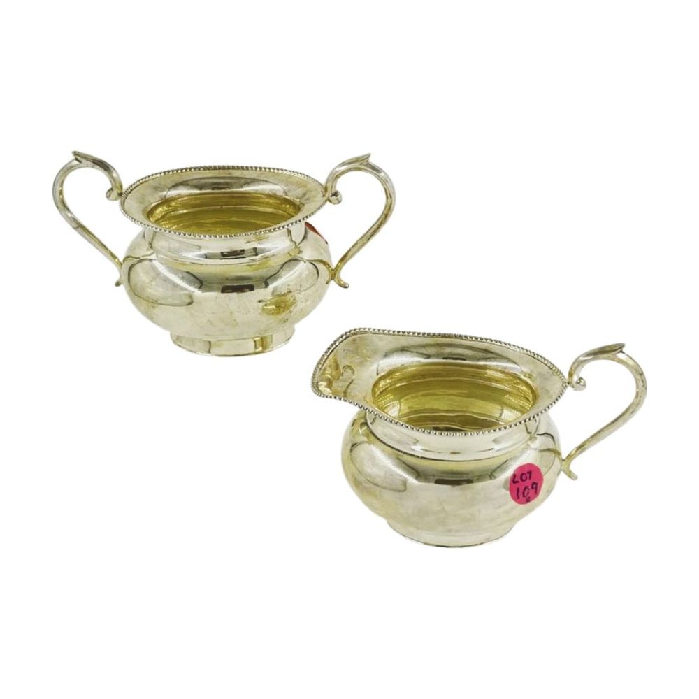 Lot 109: STERLING SILVER CREAM & SUGAR