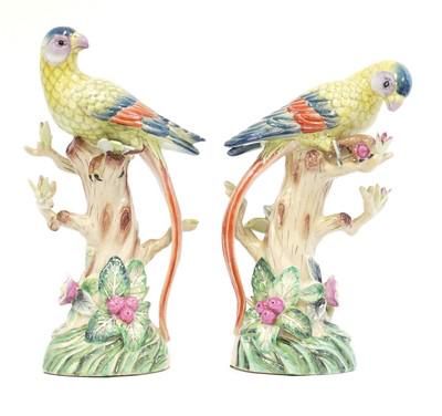 Lot 208: PAIR OF HAND PAINTED PORCELAIN PARROTS