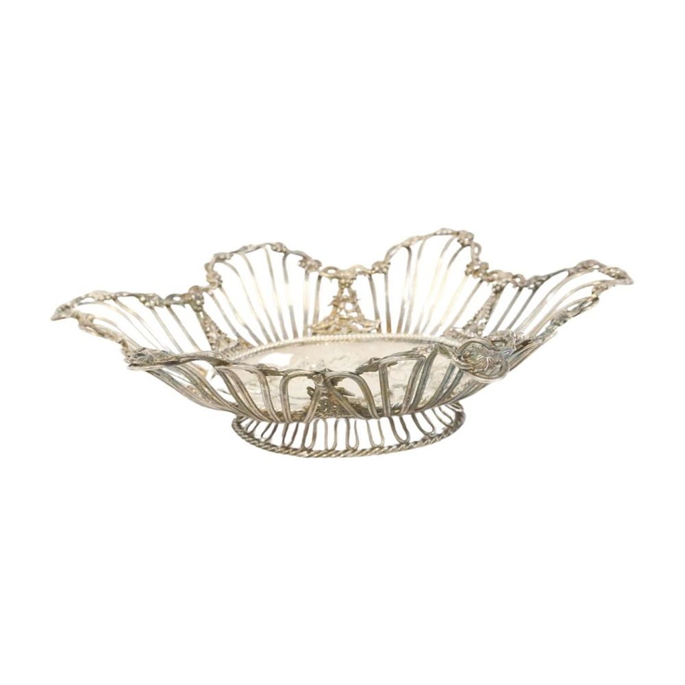 Lot 250: ANTIQUE ORNATE SILVER BREAD BASKET CUPIDS
