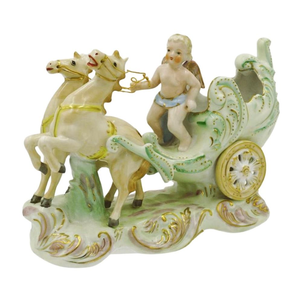 Lot 251: VINTAGE PORCELAIN CHERUB AND CHARIOT