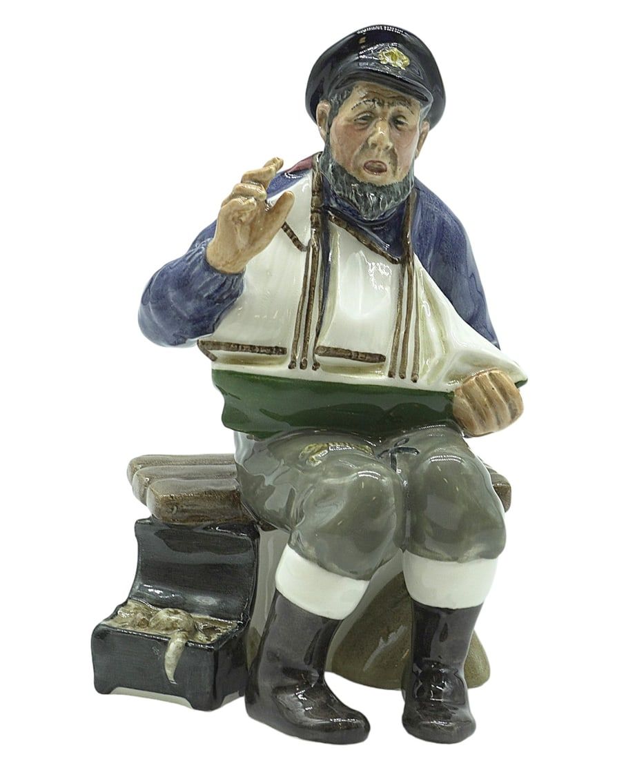 Lot 219: ROYAL DOULTON "TALL STORY" FIGURINE