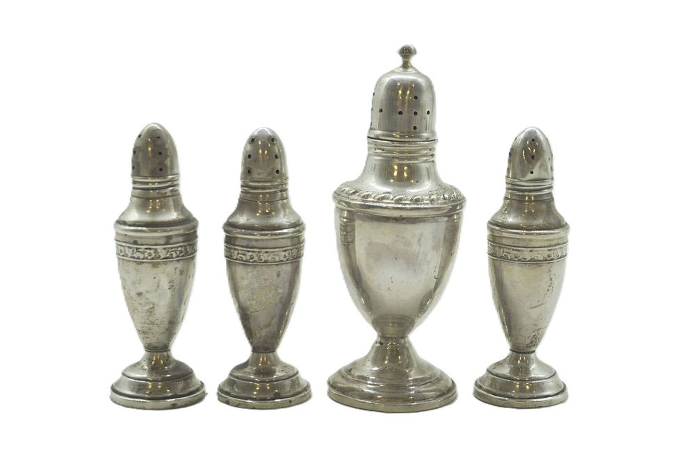 Lot 323: 4 VINTAGE STERLING SALT SHAKERS