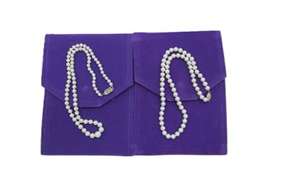 2 WHITE CULTURED FRESHWATER PEARL NECKLACES. Both in original Boxes and Cases. One with sterling 
