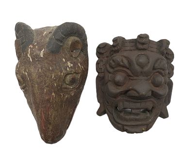 TWO ANTIQUE ASIAN CARVED WOOD MASKS. 2 Antique Asian Carved Wood Masks. Both with red wax seals. 