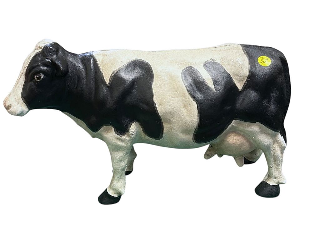 Lot 264: LARGE HAND PAINTED CAST IRON COW