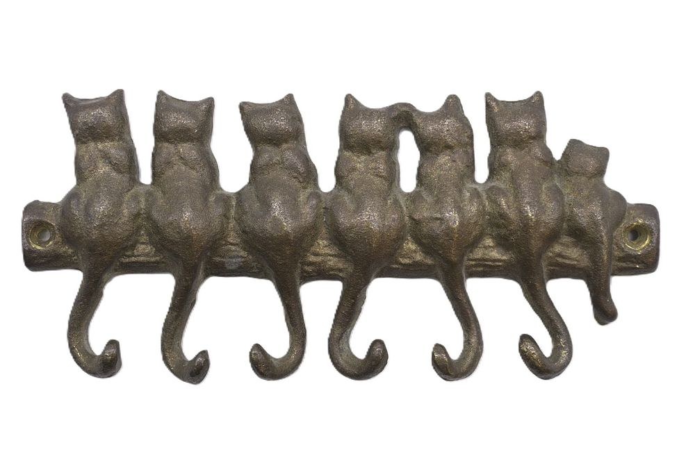 Lot 346: VINTAGE CAST IRON CAT TAIL HOOKS