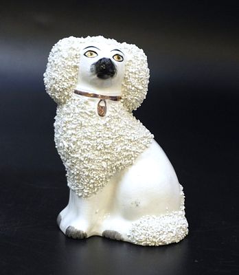 ENGLISH STAFFORDSHIRE SPANIEL CONFETTI. Antique Staffordshire Spaniel in white confetti glaze. 