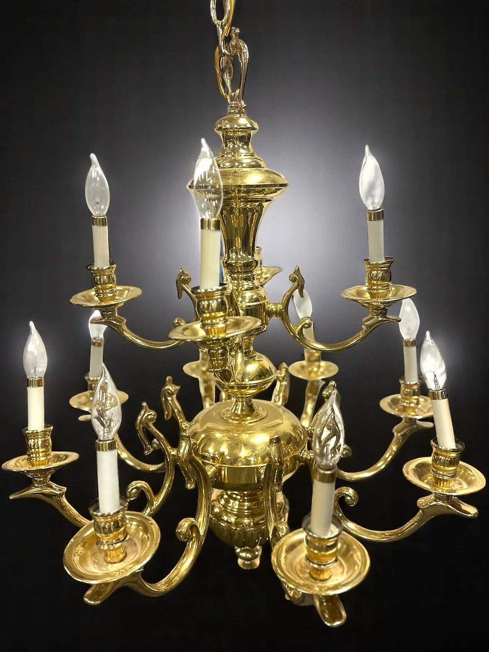 Lot 179: LARGE VINTAGE SOLID BRASS 12 ARM CHANDELIER