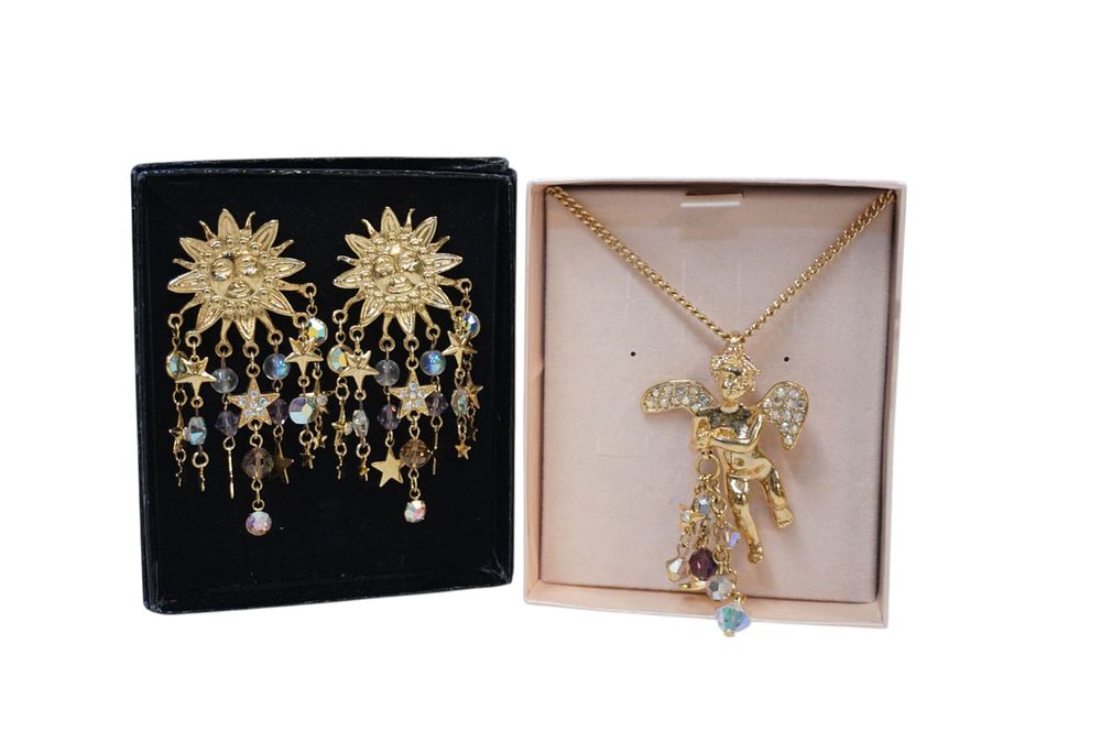 Lot 235: KIRKS FOLLY CHERUB NECKLACE AND SUN EARRINGS