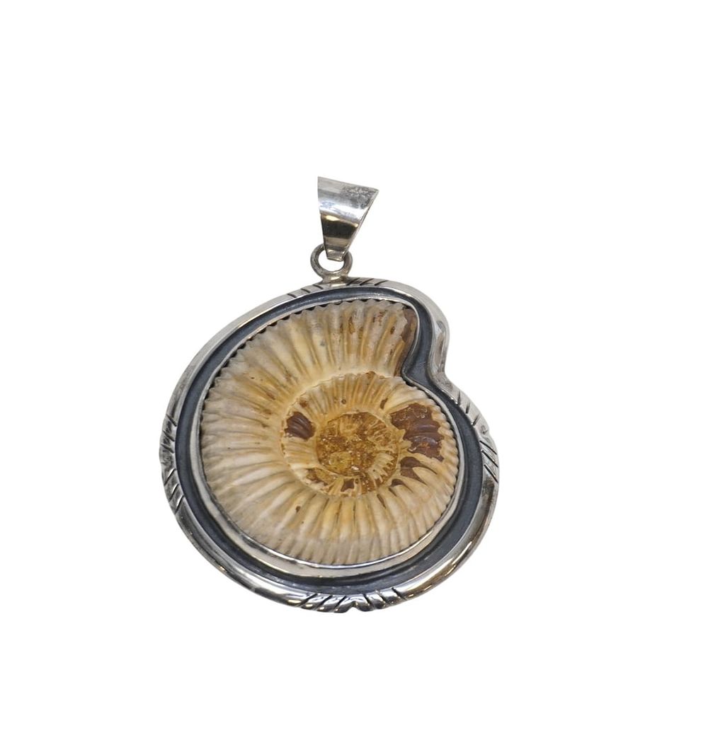 Lot 182: DESIGNER CHARLES ALBERT STERLING SILVER AMMONITE PENDANT