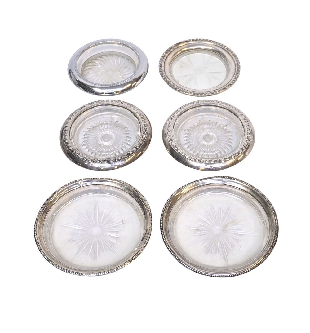 Lot 282: 6 VINTAGE STERLING RIM COASTERS