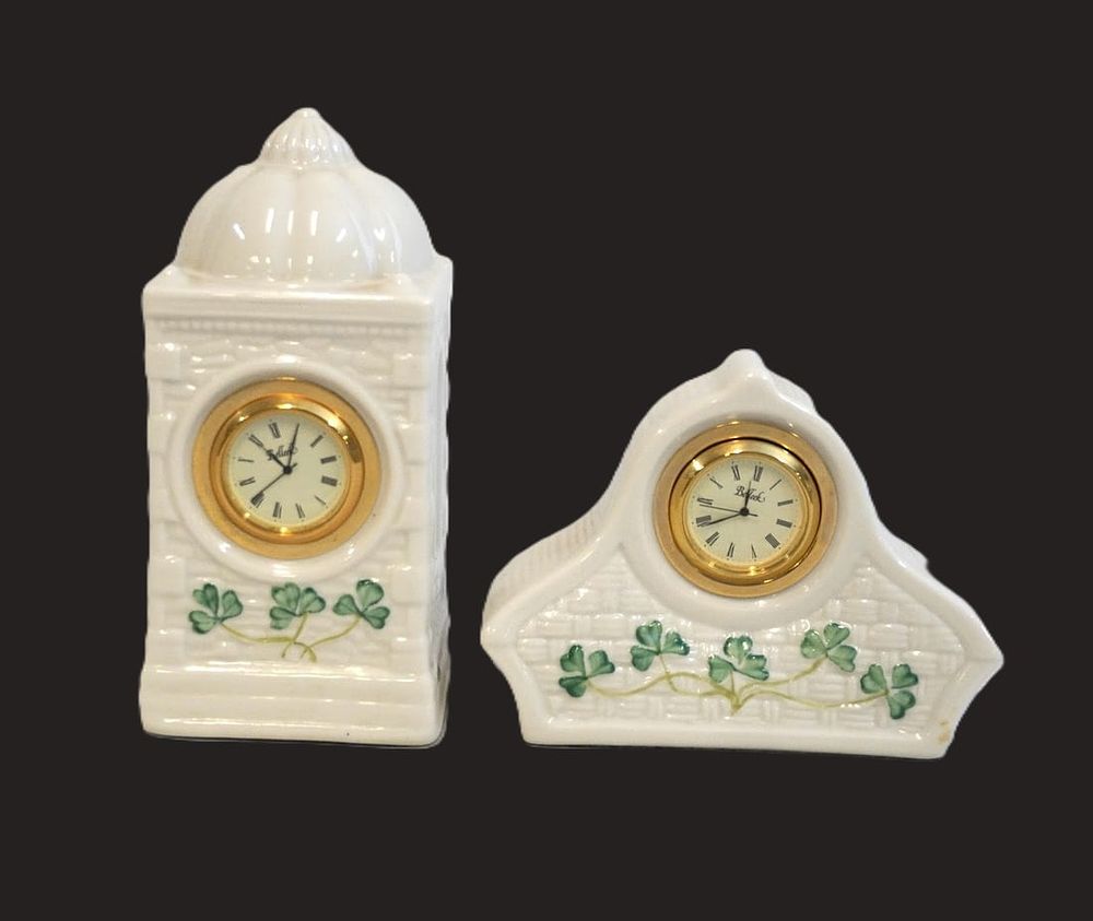 Lot 169: PAIR OF BELLEEK IRISH PORCELAIN SHAMROCK CLOCKS