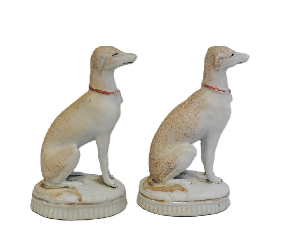 Lot 179: 2 ANTIQUE ENGLISH STAFFORDSHIRE GREYHOUNDS