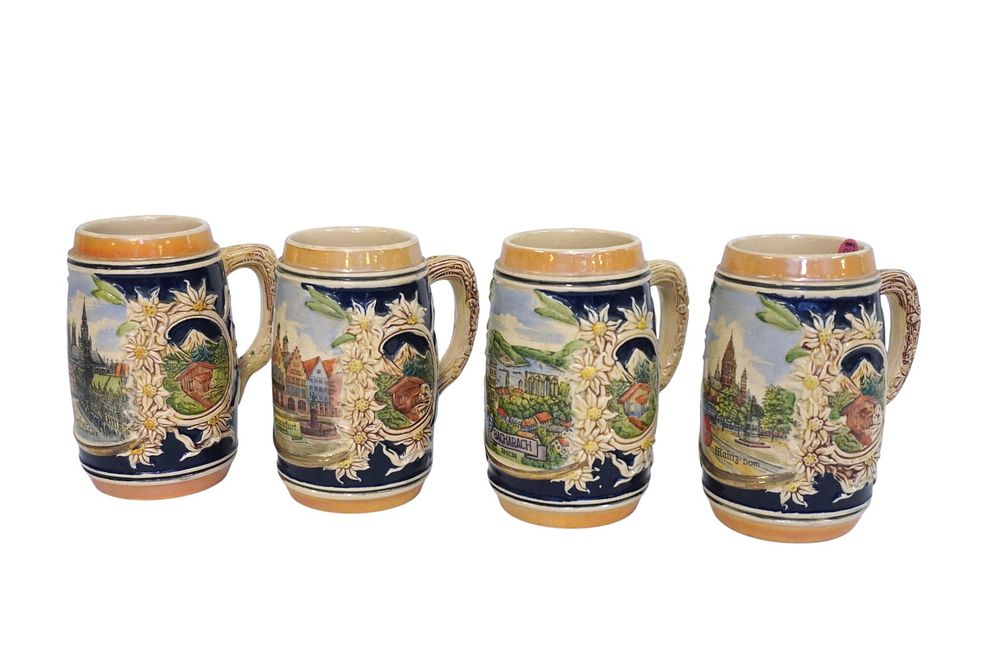 Lot 219: SET OF 4 VINTAGE STEINS