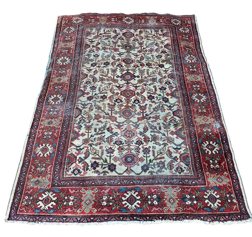 Lot 156: ANTIQUE HAND KNOTTED PERSIAN HERIZ WOOL RUG