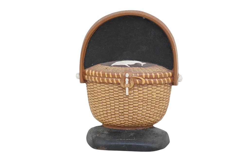 Lot 278: VINTAGE LIMITED EDITION CAST IRON NANTUCKET FRIENDSHIP BASKET DOORSTOP