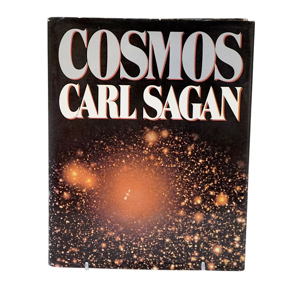 Lot 165: SIGNED CARL SAGAN "COSMOS" BOOK 1980