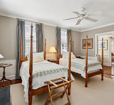 ANTIQUE AMERICAN TWIN FOUR POSTER MAPLE BEDS. A matched pair of exceptional American Maple Twin 