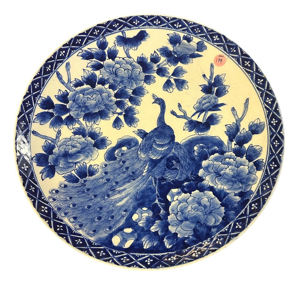 Lot 174: ANTIQUE LARGE JAPANESE BLUE AND WHITE IMARI PEACOCK PLATE