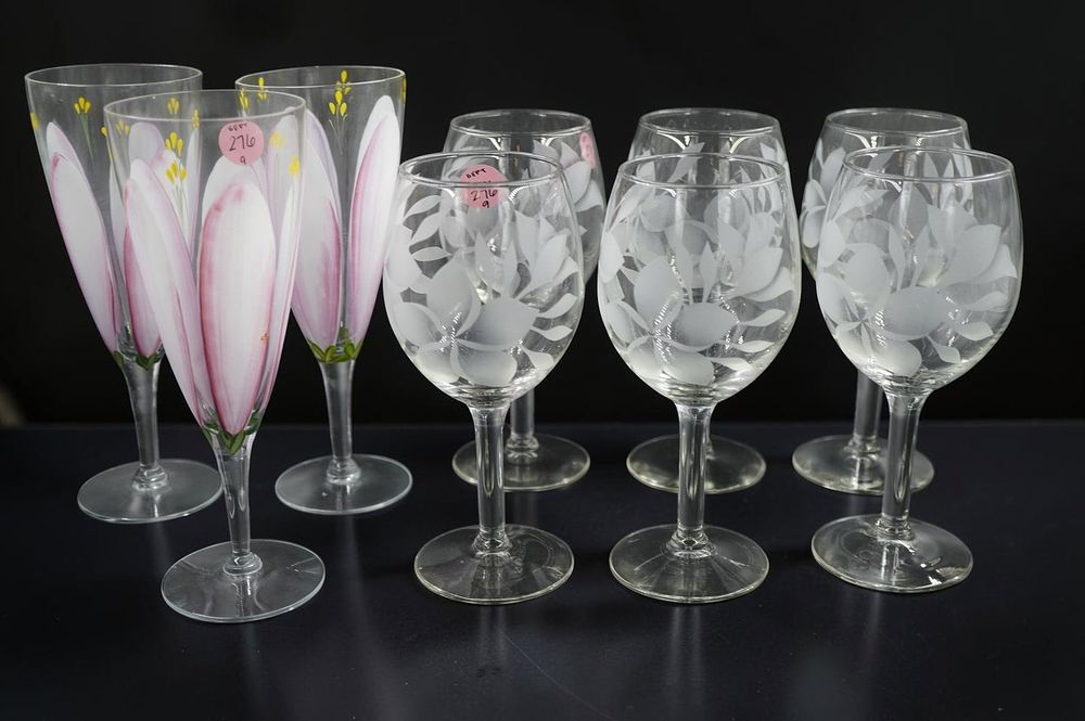 Lot 276: 9 FLORAL THEMED WINE GLASSES