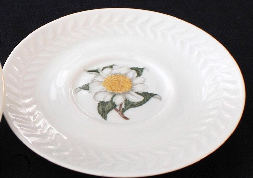 Lot 280: 10 MID CENTURY THEODORE HAVILAND CAMELLIA PLATES