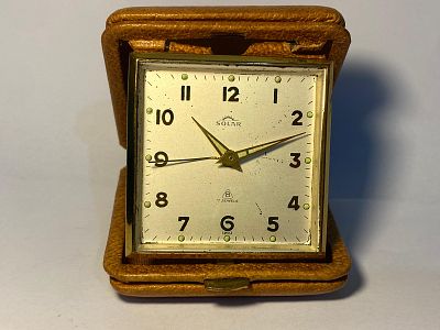 Antique/vintage 7 jewel 8 days Swiss travel clock.The condition is not working and there is no 