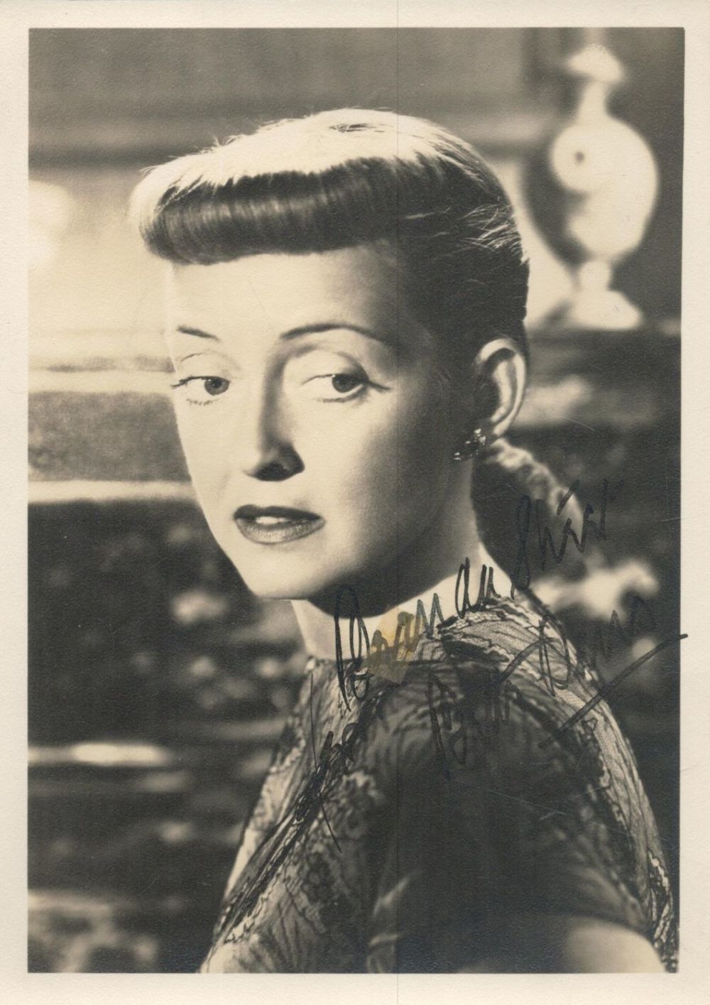 Lot 213: Bette Davis signed 7x5 inch colour photo. Good...