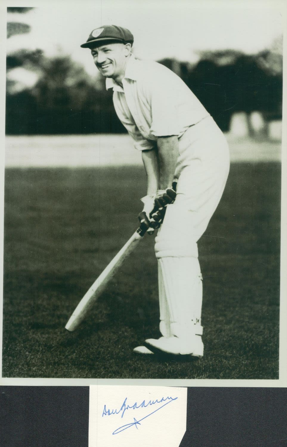 Lot 227: Cricket Don Bradman signed card cutting accompanied with...