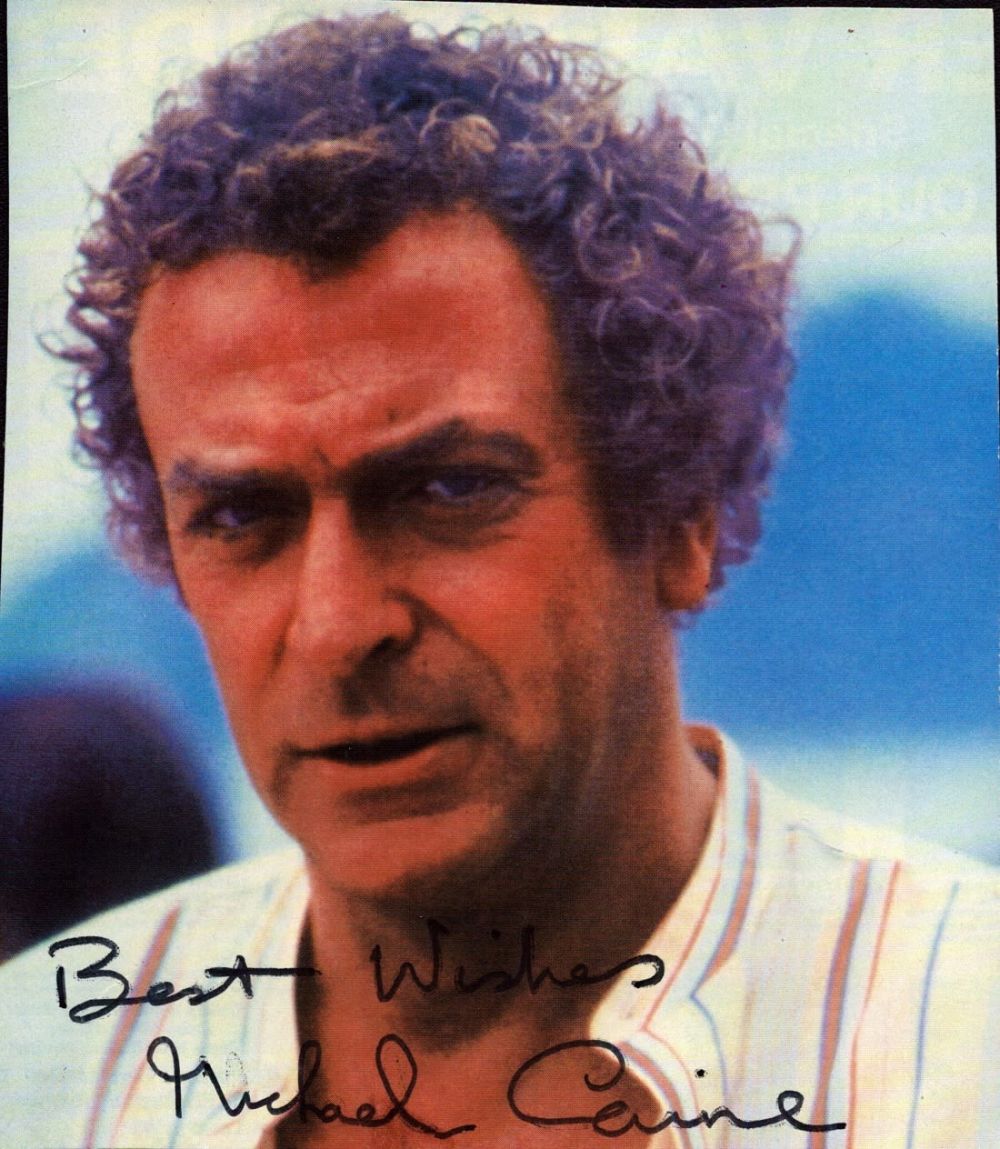 Lot 393: Michael Caine signed 6x5inch colour photo. Good condition...