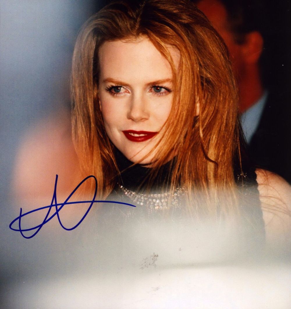 Lot 434: Nicole Kidman signed 7x7inch colour photo. Good condition...