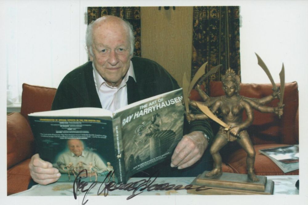 Lot 704: Ray Harryhausen signed 6x4 inch colour photo. Good...
