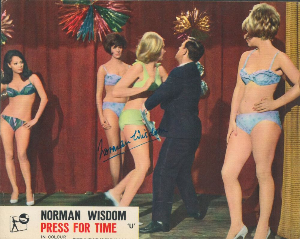 Lot 748: Norman Wisdom signed 10x8 colour photo. Good condition...