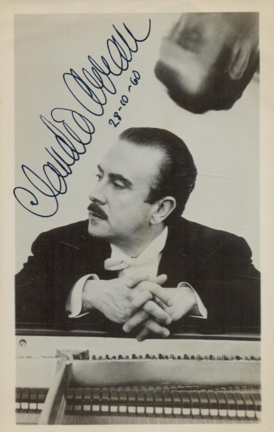 Lot 63: Claudio Arrau, a signed 5.5x3.5 photo. A Chilean...