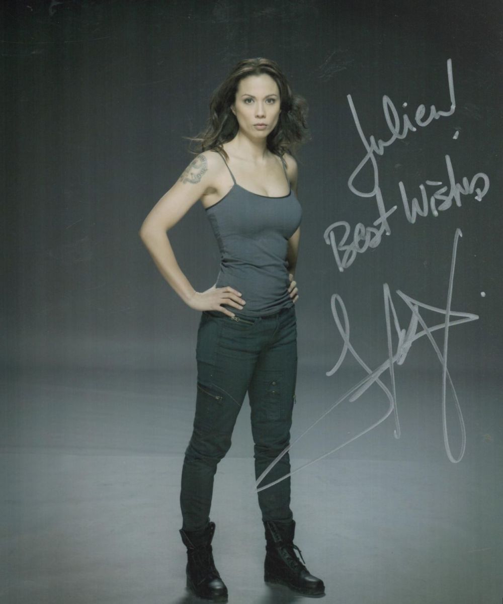 Lot 328: Lexa Doig signed colour photo 10x8 Inch. Dedicated....